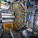 Atlas detektoren på CERN. Folk arbejder helt nederst ved Atlas detektoren ca. 100 meter under jorden